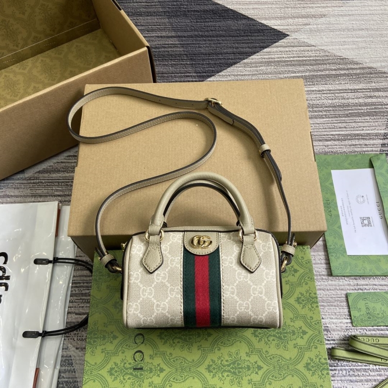 G*u*i top handle bags